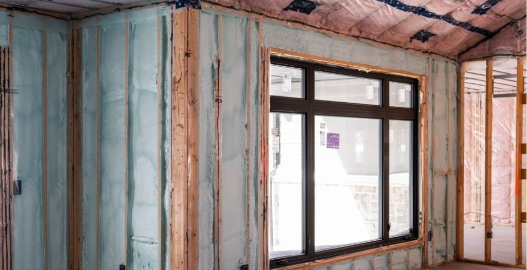 House under construction with insulation visible